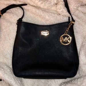 Black crossbody Michael Kors purse